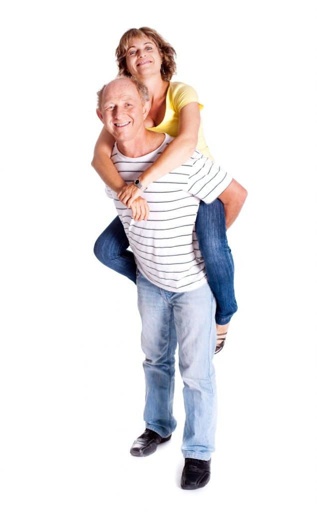 Senior Man Giving Woman Piggyback Ride